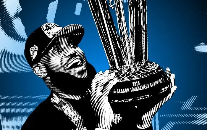 Lebron James of the Los Angeles Lakers Holding the 2023 NBA Cup from the NBA In-Season Tournament