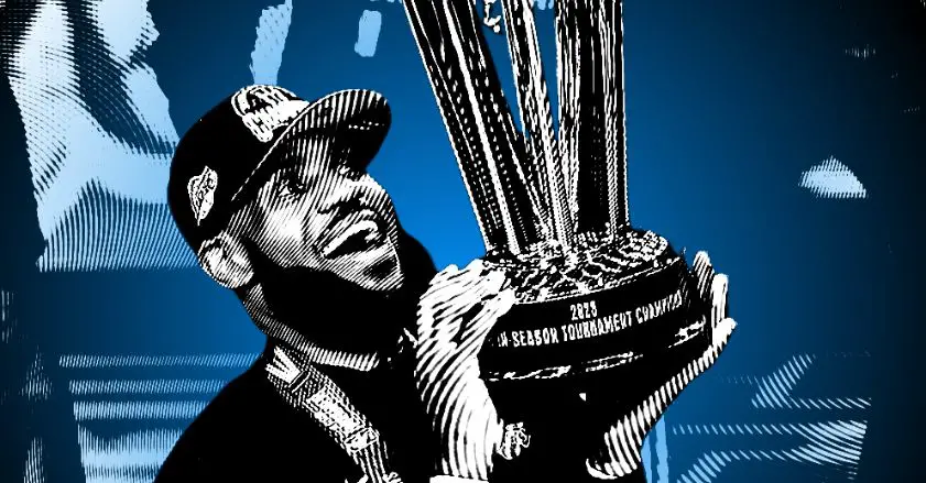 Lebron James of the Los Angeles Lakers Holding the 2023 NBA Cup from the NBA In-Season Tournament